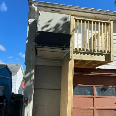 Mobility lift installed next to second story deck